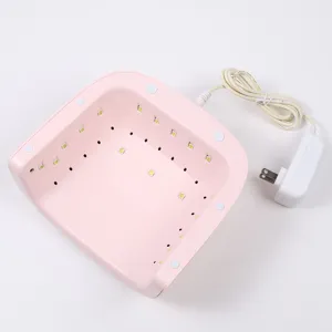 Vista interna dettagliata di una lampada per unghie LED rosa da 48W professionale