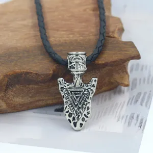 Vintage silver arrowhead pendant necklace with Valknut symbol on black braided cord.