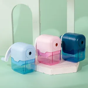 Detailed view of hand-cranked pencil sharpeners in multi colors with transparent waste box.