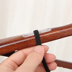 Transparent non-slip adhesive strips for backpack straps and hangers, textured surface