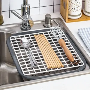 Escurridor de fregadero de cocina de plástico con rejilla blanca para secar cubiertos y utensilios