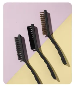 Detailed view of 3-piece kitchen cleaning brush set with wire and nylon bristles