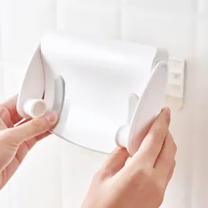 Wall-mounted white plastic kitchen paper towel holder with punch-free installation