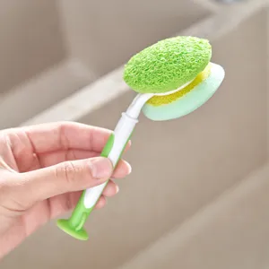 Self-standing dish sponge brush with suction cup base and double-sided cleaning head