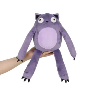 Detail view of a purple little monster plush toy held in hand, showing soft texture.