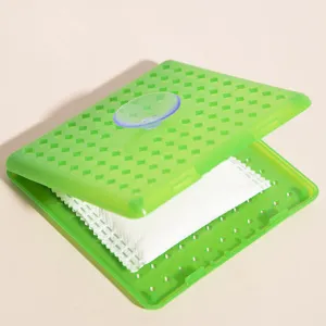 Green refrigerator deodorizer box with suction cup and filter bag for odor removal