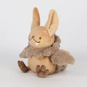 Vue latérale de la peluche Polliwog Bat avec col en fourrure marron et crocs blancs