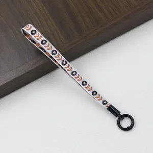 Short ethnic woven wrist lanyard strap with geometric patterns for phone and keys