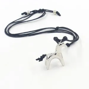 Detail of silver horse pendant necklace with adjustable black cord and silver beads