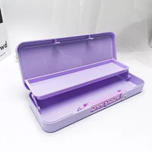 Close-up detail of the purple double-layer plastic pencil case with combination lock mechanism.