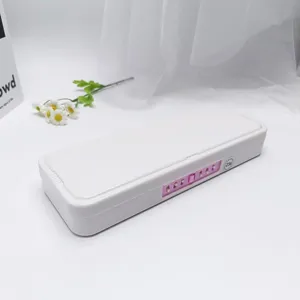 Detail view of double-layer pencil case with password lock, pink accent and neat storage.