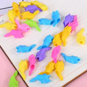 Colorful silicone dolphin pencil grips detail shot, ideal for kids writing posture correction.