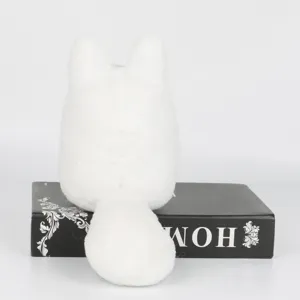Vue arrière détaillée d'un doudou renard blanc avec une fourrure douce et une queue ronde