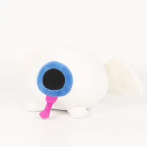 Vue détaillée d'une peluche globe oculaire blanche avec des ailes et une langue rose.