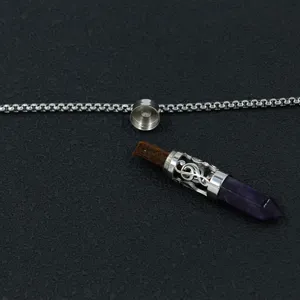 Detailed view of screw-open stainless steel diffuser necklace with purple crystal