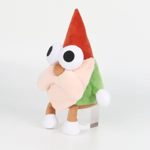 Vue latérale détaillée de la peluche Willem de The Gnome Show avec son chapeau rouge
