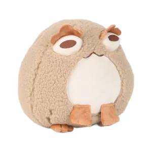 Peluche de sapo redondo suave con textura esponjosa y diseño de rana de dibujos