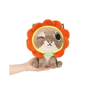 Adorable Flower Lady Gumbus plush toy with lion mane hood shown being held in hand