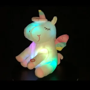 Adorable unicornio de peluche con luz LED, alas de arcoíris y pelaje suave para niños