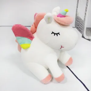Suave peluche de unicornio blanco con alas de colores y función de luz LED mágica