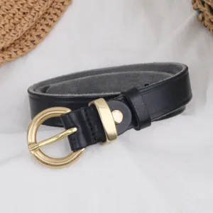 Detail shot of a black genuine leather belt with a gold round buckle, perfect for dresses.