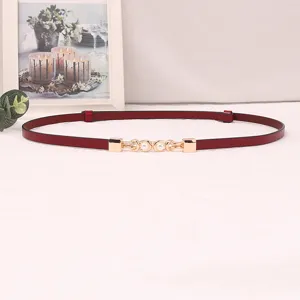 Red thin leather belt for women with elegant gold pearl metal buckle detail for dress styling