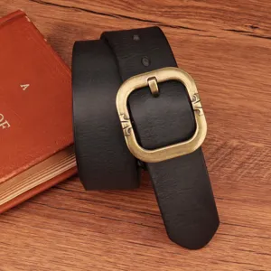 Genuine leather vintage belt detail showing textured black strap and ornate retro brass buckle.