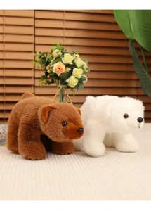 Peluches réalistes d'ours brun et d'ours polaire blanc présentées ensemble sur fond