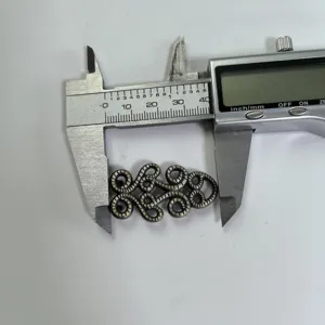 Vintage zinc alloy belt buckle replacement part featuring intricate scroll design for women thin belts.