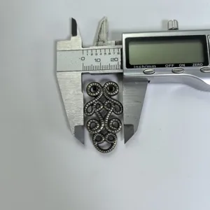 Retro zinc alloy thin belt buckle replacement head with vintage scroll design for women apparel.