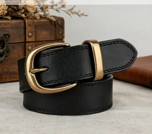 Women vintage black leather belt with antique copper buckle, casual retro stitching detail.