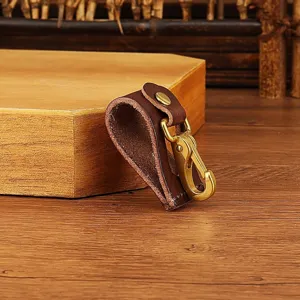 Durable leather belt loop key holder with vintage brass hook for daily outdoor use and waist accessory