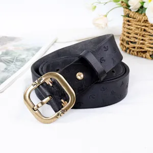 Vintage genuine leather belt for women with antique brass buckle and embossed anchor patterns.