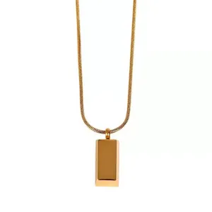 Close-up detail of a minimalist gold-plated titanium steel rectangular bar pendant necklace