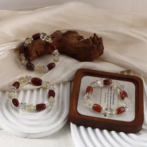 Exquisite detail shot of natural crystal bracelets with citrine and clear quartz beads