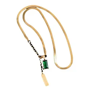 Detailed view of titanium steel snake chain necklace with green gemstone and Good Luck tag