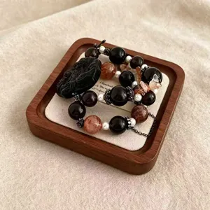 Handgefertigtes Armband aus schwarzem Obsidian und Super Seven Kristall mit Fuchshänger.