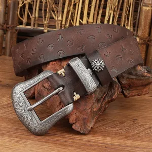 Vintage genuine leather embossed pin buckle belt with intricate carved metal buckle and studs.