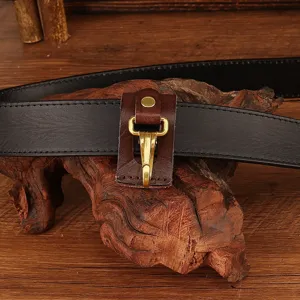 Black leather belt with a creative brown leather key clip and metal hook accessory.