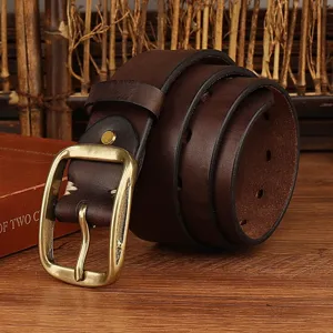 Retro dark brown leather belt with vintage pin buckle for men and women, classic casual jeans belt.