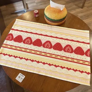 Cute strawberry cake pattern linen table mat detail, korean style decorative desk pad background cloth.