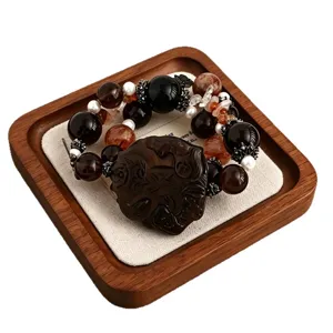 Armband aus Obsidian und Rauchquarz mit geschnitztem Fuchs-Anhänger und Perlenakzenten
