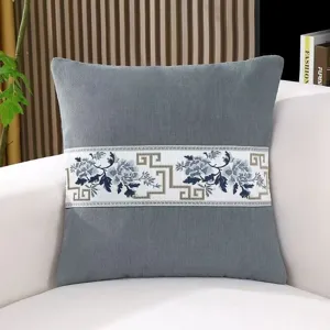 New Chinese retro throw pillow detail showcasing exquisite blue floral embroidery.