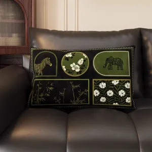 Vintage green rectangular throw pillow with elegant retro animal and floral pattern for sofa.