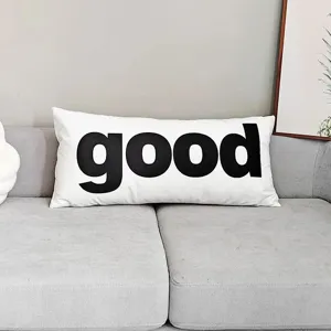 Cojin largo blanco con impresion de letras negras good para la vista detallada de sofa