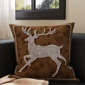 Vintage brown decorative throw pillow with elegant white beaded deer design for sofa couch.