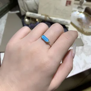 Detailed close-up showing texture of geometric blue turquoise ring in S925 silver on hand
