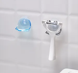 Universal wall-mounted suction cup razor holder for bathroom organization and storage