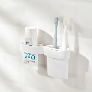 Organizer da bagno a parete bianco per spazzolini e dentifricio con design senza fori