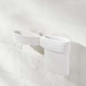 Mensola da bagno a parete con ventosa per spazzolini da denti in colore bianco puro